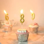 ⁦شمع ارقام ذهبي لاعياد الميلاد⁩ - الصورة ⁦2⁩